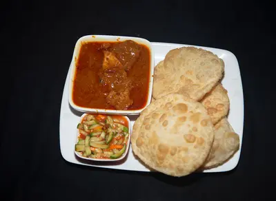 Luchi with Chicken Masala