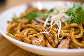Gravy noodles in bowl with chicken