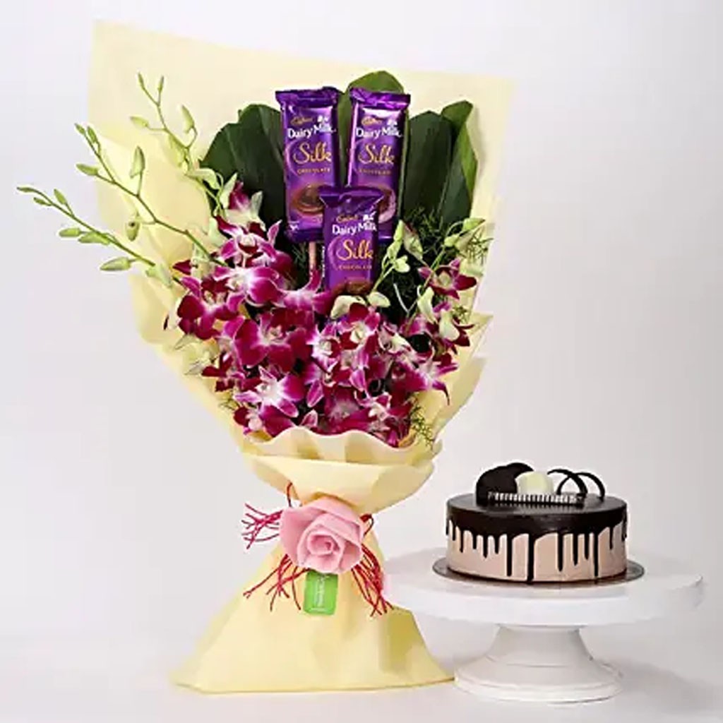 Chocolate Cake with Dairy Milk Chocolates & Orchids