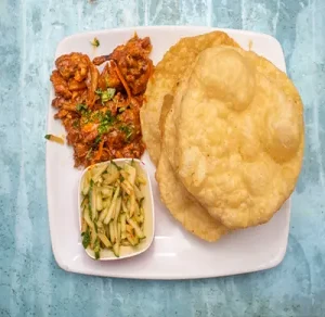 Luchi with Mughlai Chaap