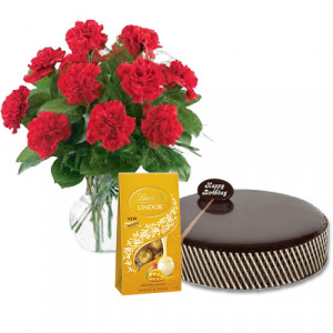 chocolate-mud-cake-with-red-carnations-lindt-mango-chocolates
