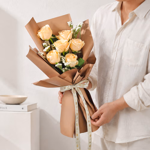 serene-peach-roses-handtied-bouquet